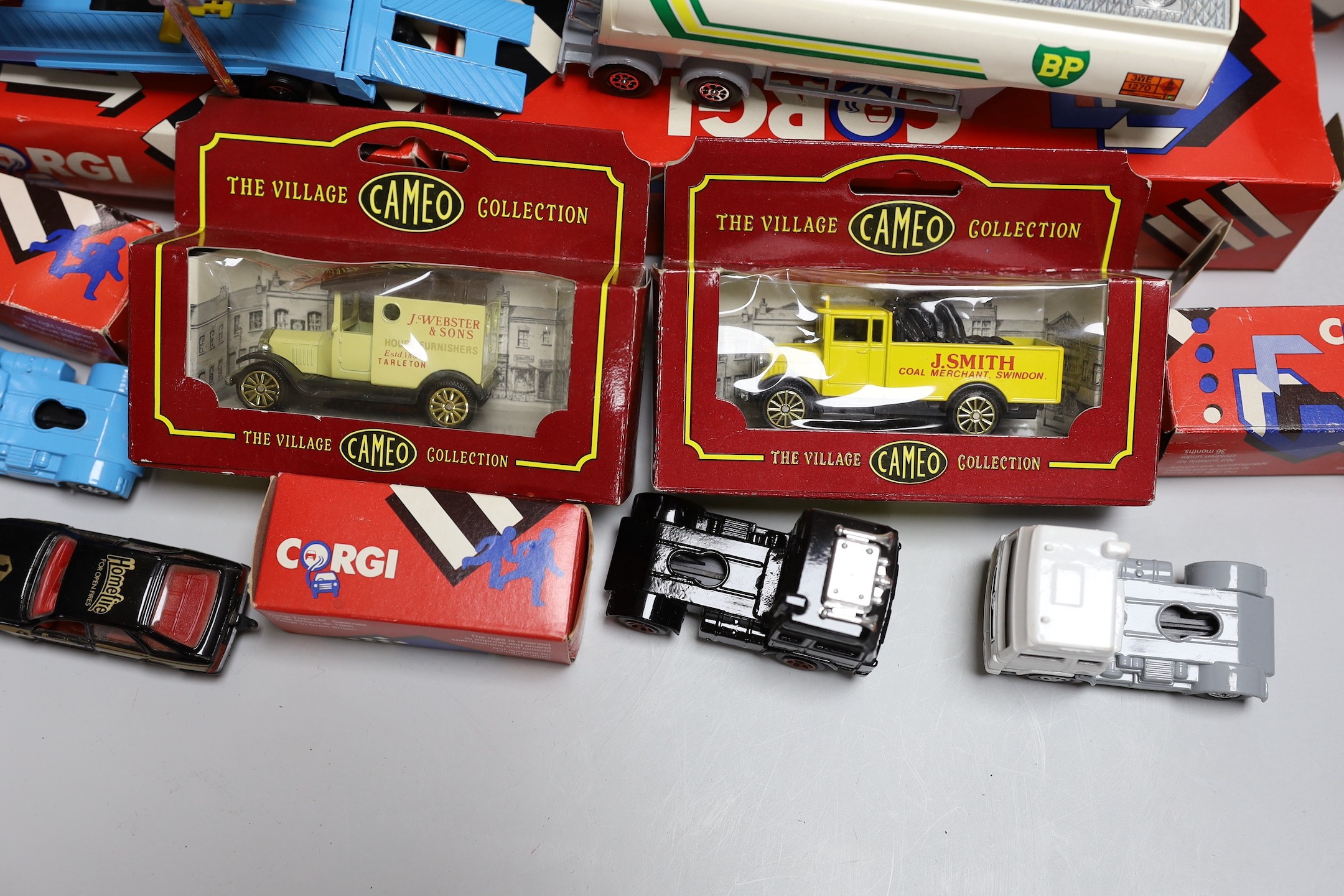 A quantity of corgi cars and trucks